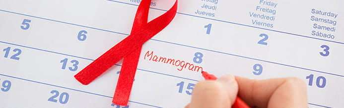 Legacy patient writting mammogram in calendar