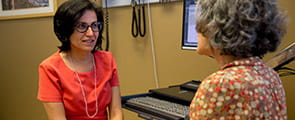 Legacy patient talking to doctor about mammograms