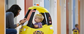 Boy in car and mom