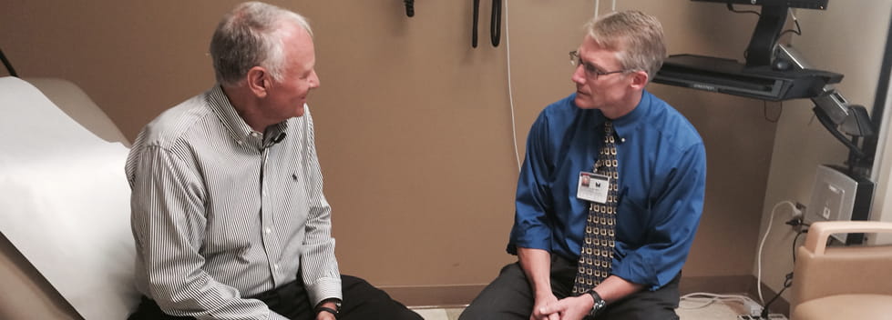 Doctor and patient discuss colon cancer
