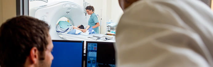 Medical team operating computers