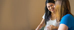 Pregnant friends talking