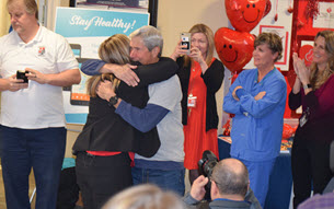 Rossman and Brenner embrace