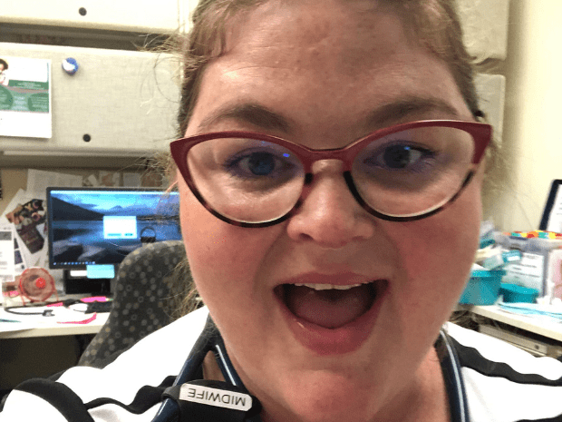 Heather Webster in an office setting smiling