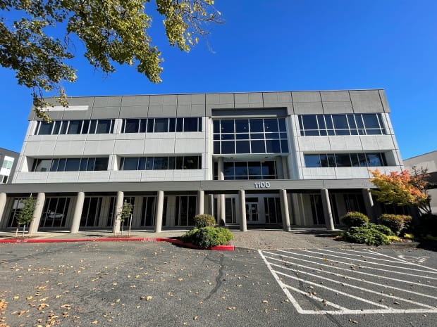 external photo of a gray building