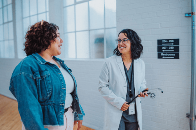 Bariatric female patient speaks with provider about surgery options