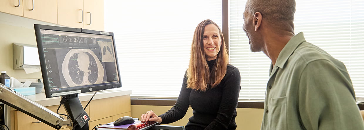 provider and patient looking at a screen