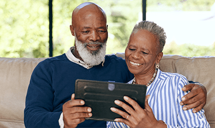 Couple watching video on device