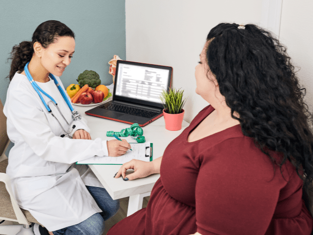 Photo of doctor talking to patient