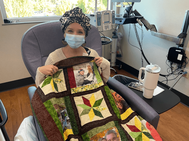 Photo of Nicole Fenison with blanket