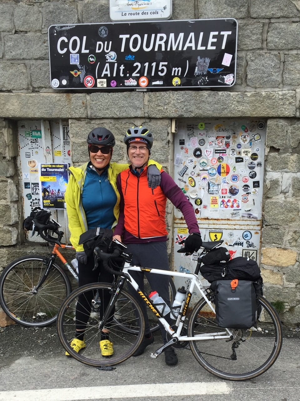 Photo of TIa and Dave standing by bicycle