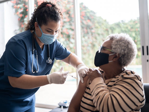 woman getting vaccinated